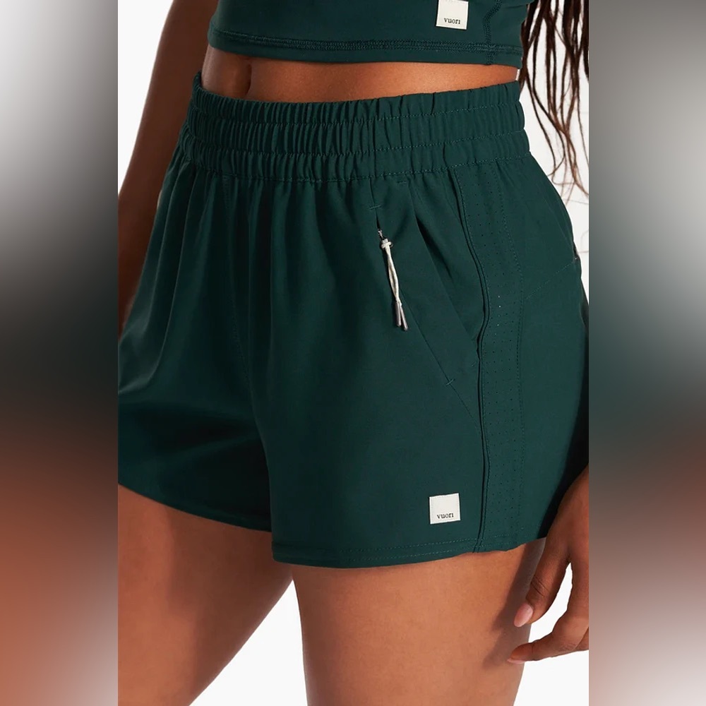Vuori Women's Athletic Shorts in Forest Green